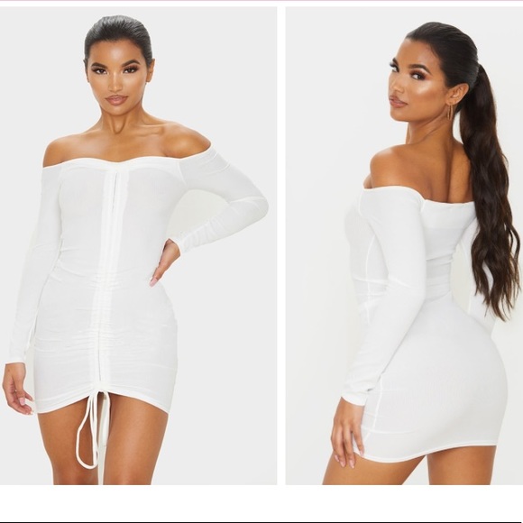 white ribbed long sleeve ruched bodycon dress
